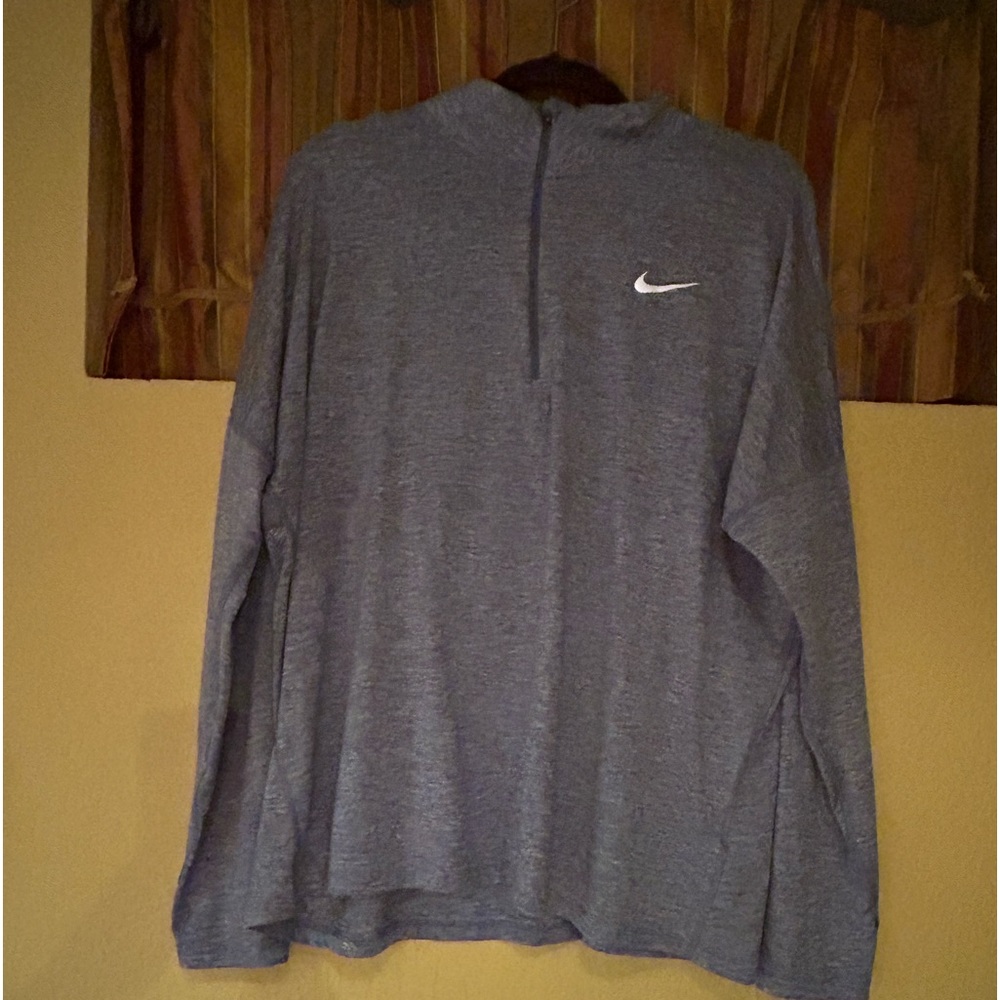 Nike size 1x Dri fit. Nike Running series. Light blue and white.  Worn once.
